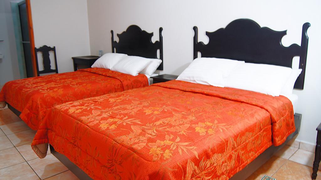 Uw Oasis Hotel La Ceiba Quarto foto
