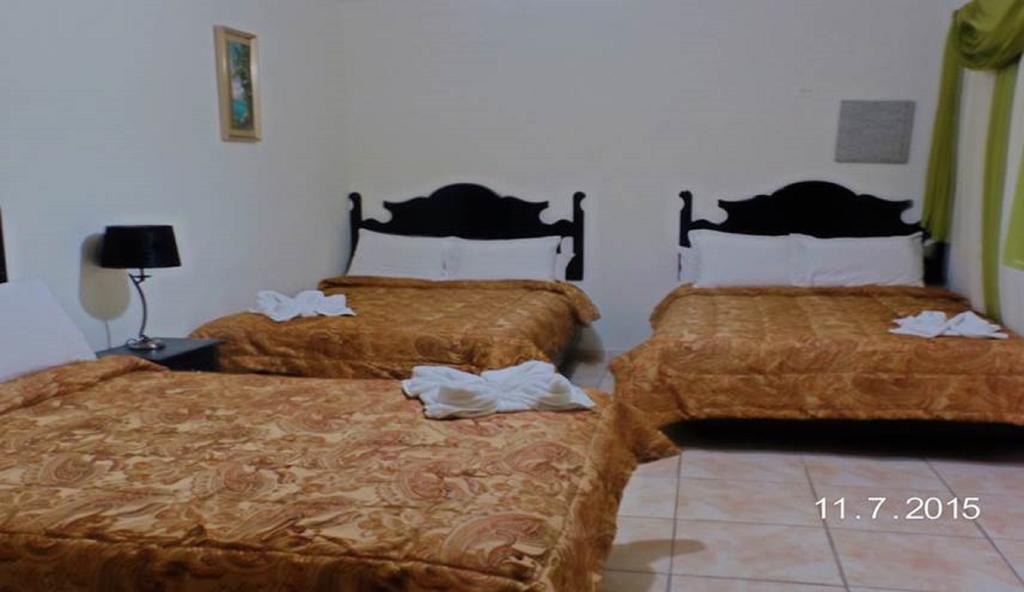 Uw Oasis Hotel La Ceiba Quarto foto